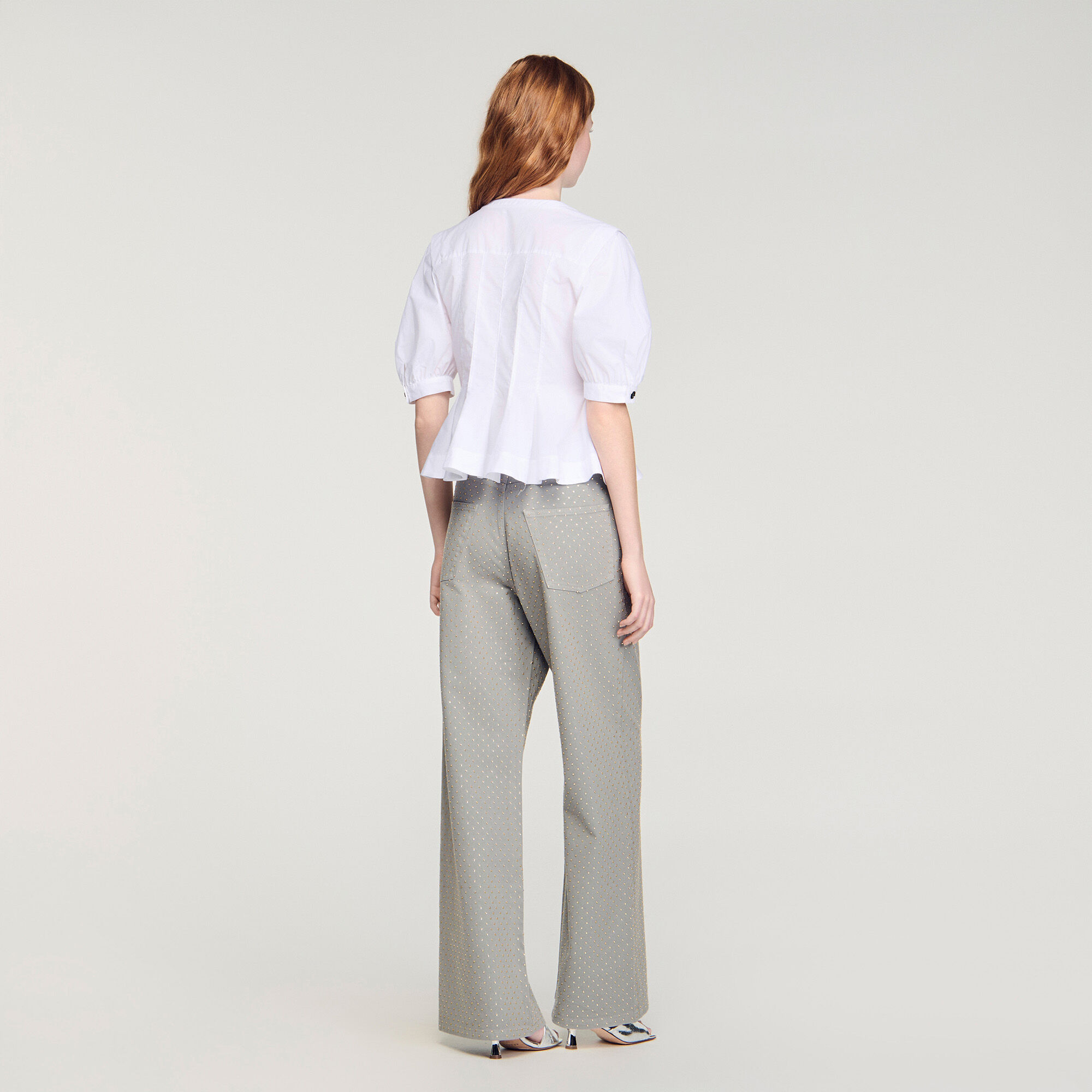 Camisa con peplum con cremallera