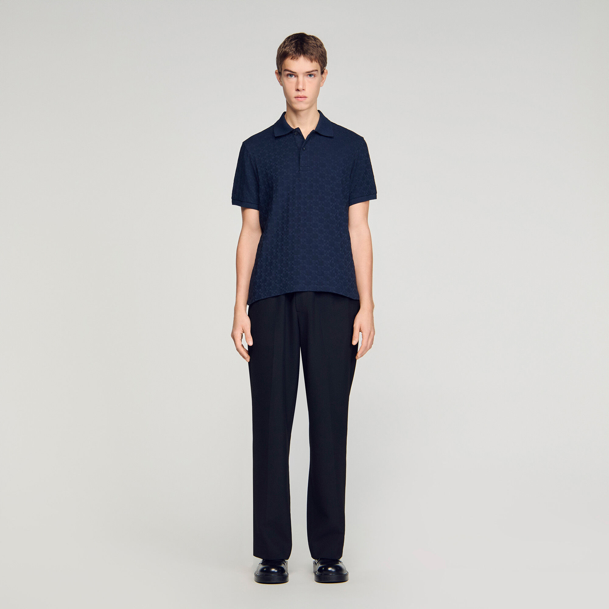 Polo jacquard con cruz cuadrada