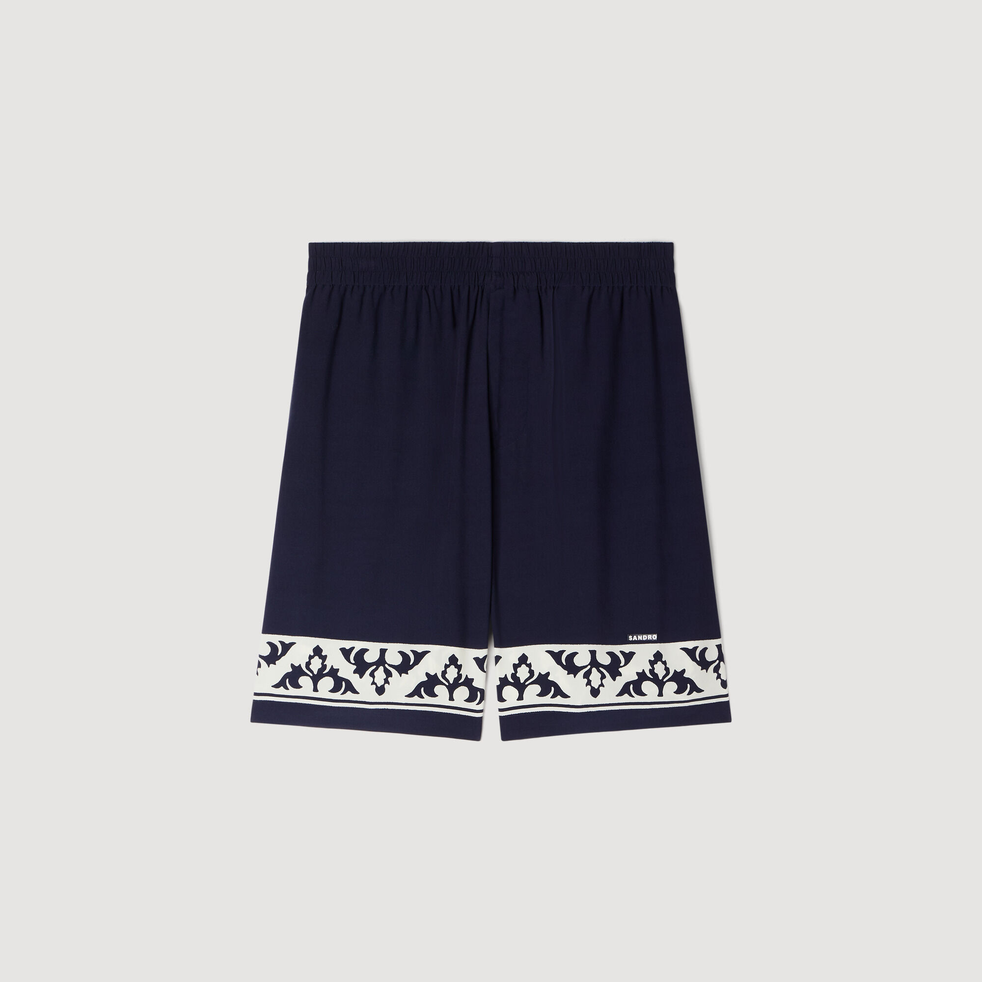 Pantalones cortos fluidos con estampado de contraste