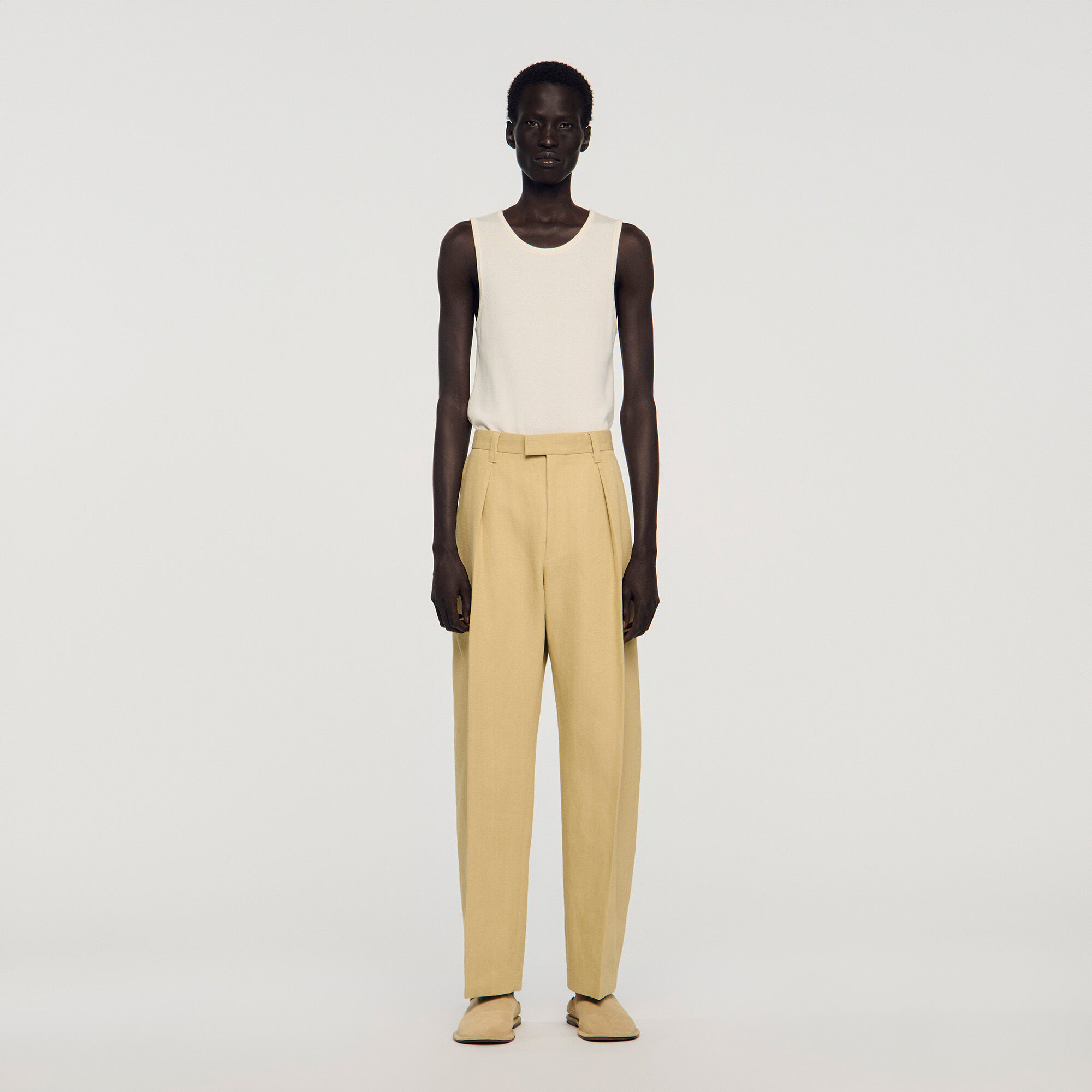 Pantalones amplios de algodón y lino con plisados