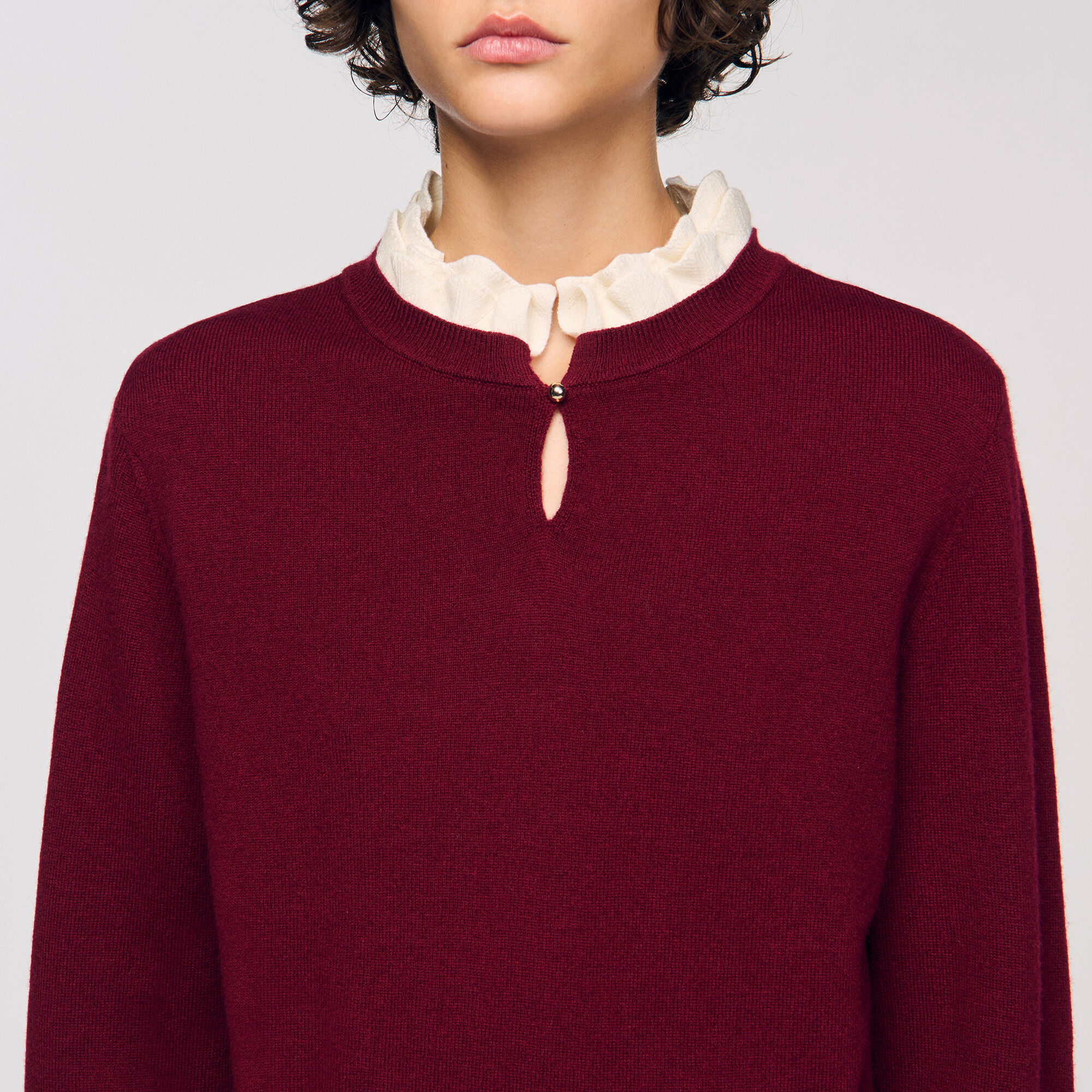 Sweater con cuello volante