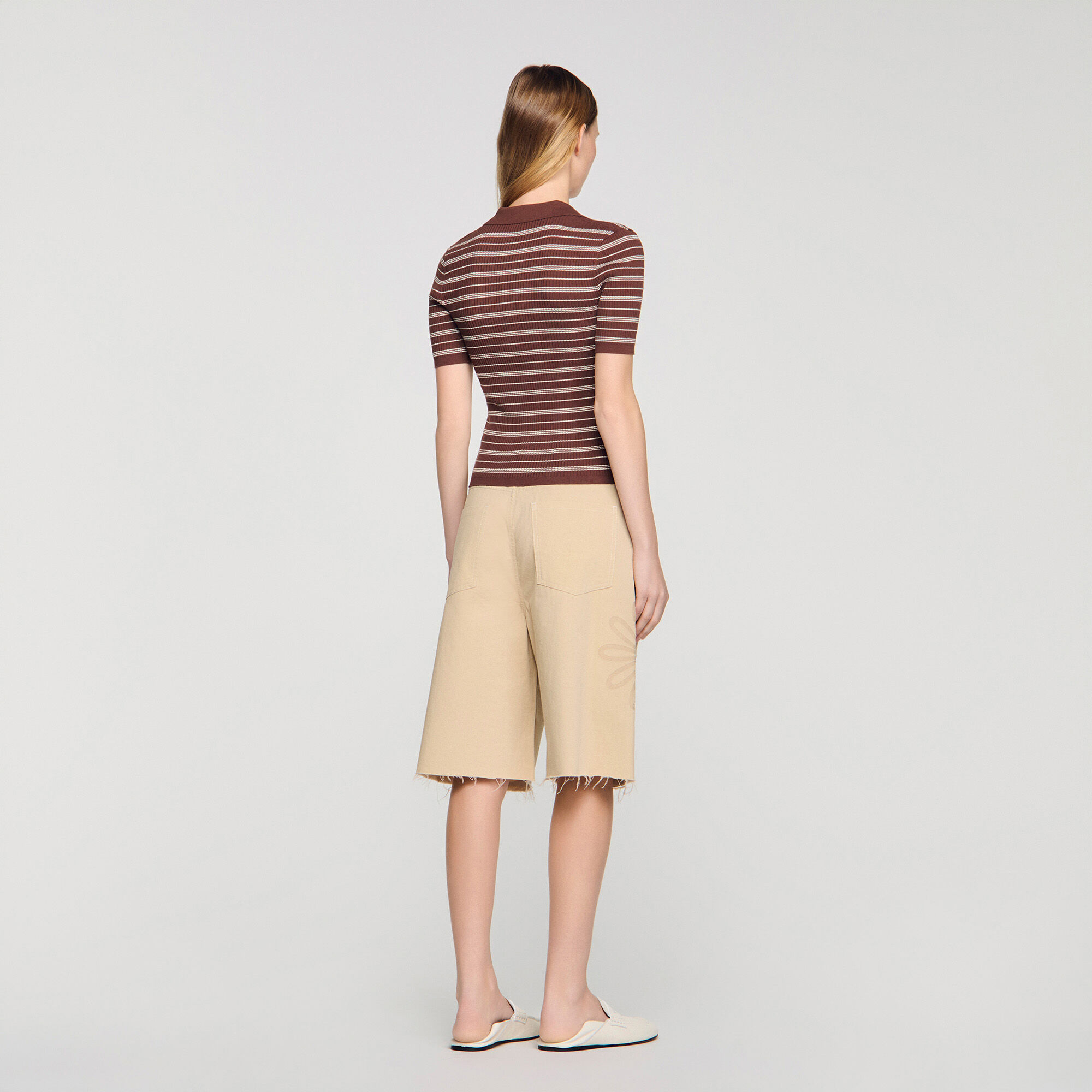Sweater de polo con cuello en V y rayas