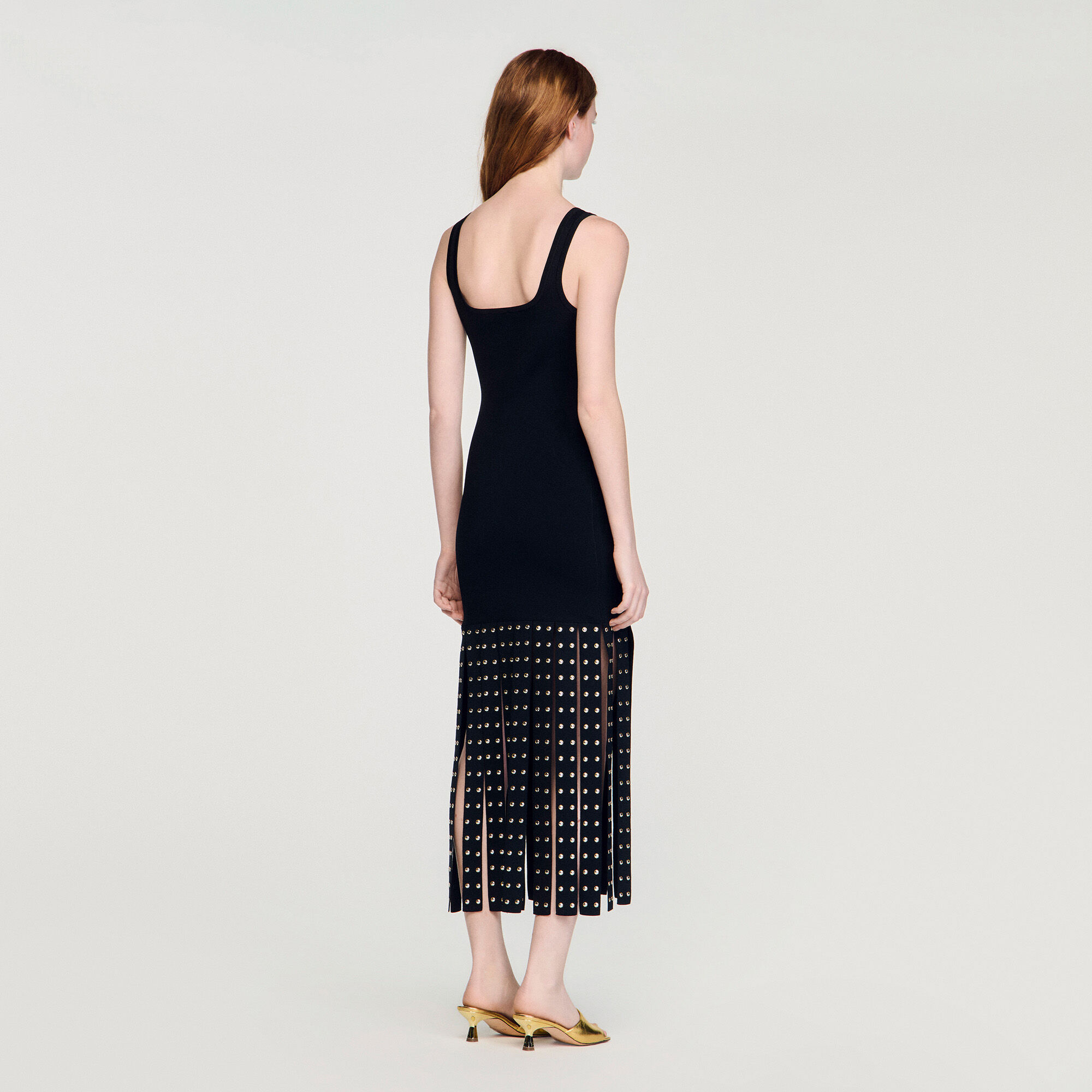 Vestido midi de punto con flecos