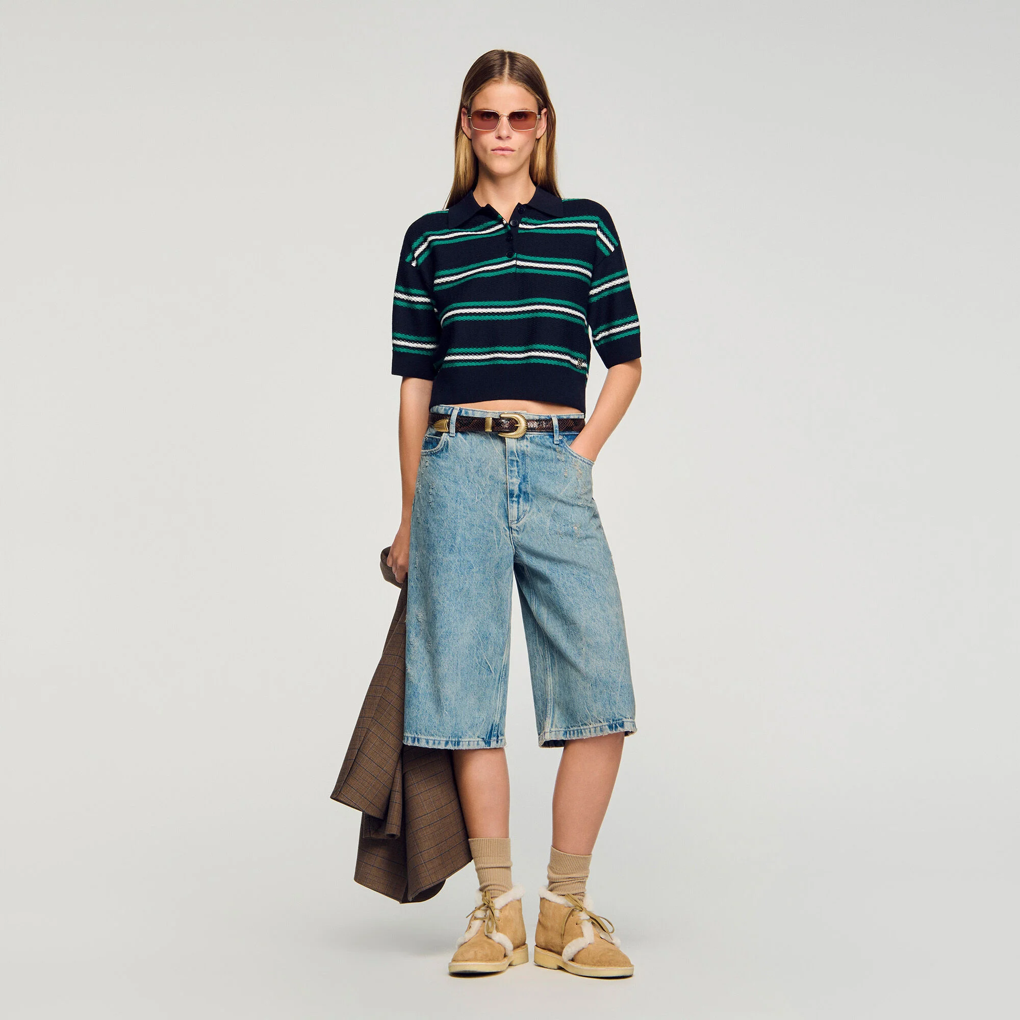 Sweater de punto con cuello polo y rayas