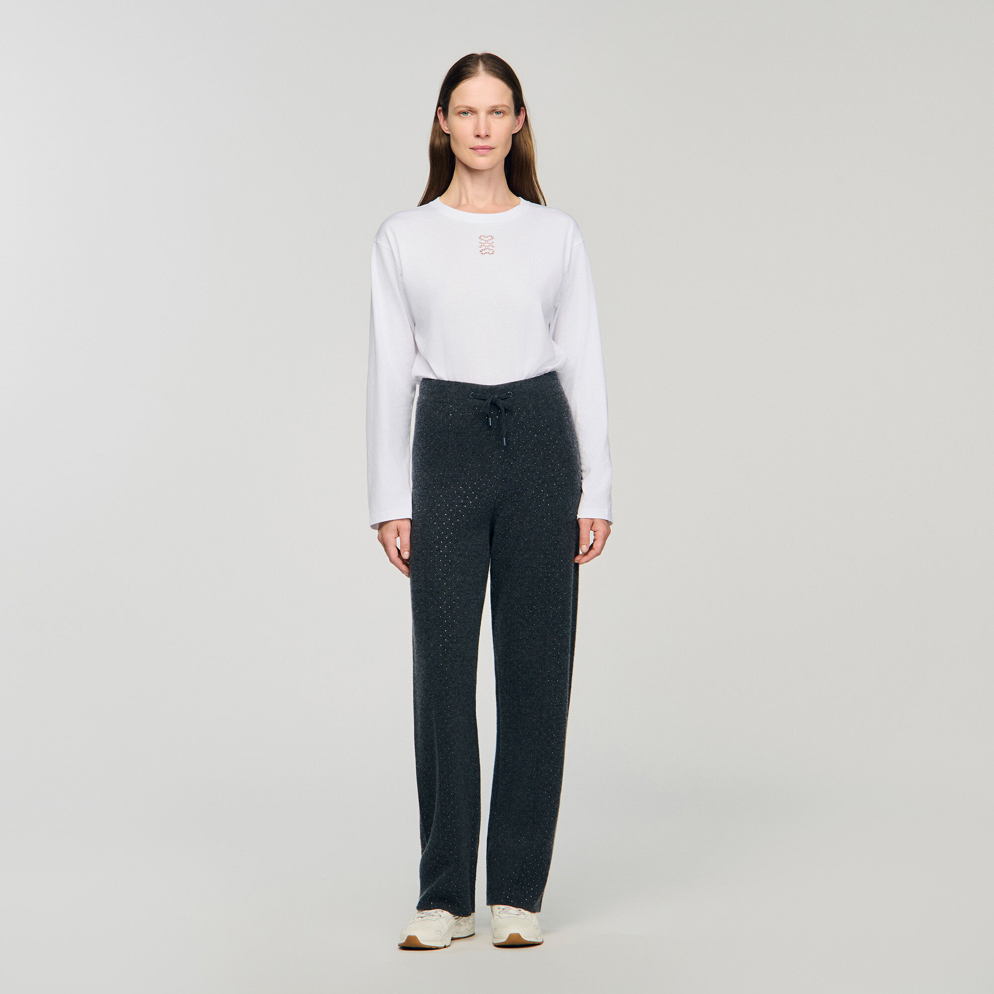 Pantalones de punto cubiertos de lentejuelas