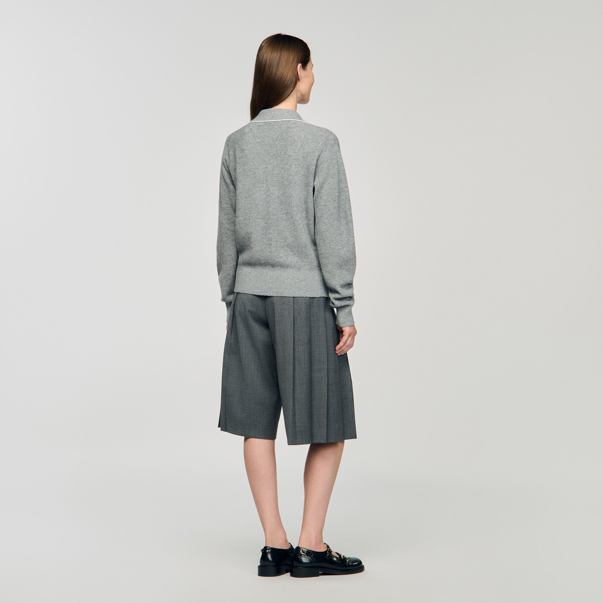 Sweater de cuello polo abierto