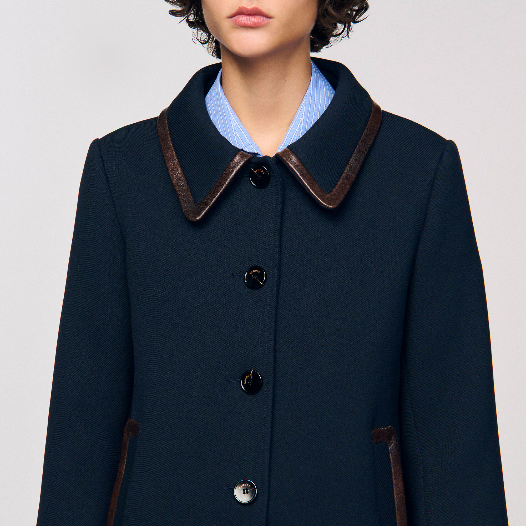 Chaqueta con detalles de cuero
