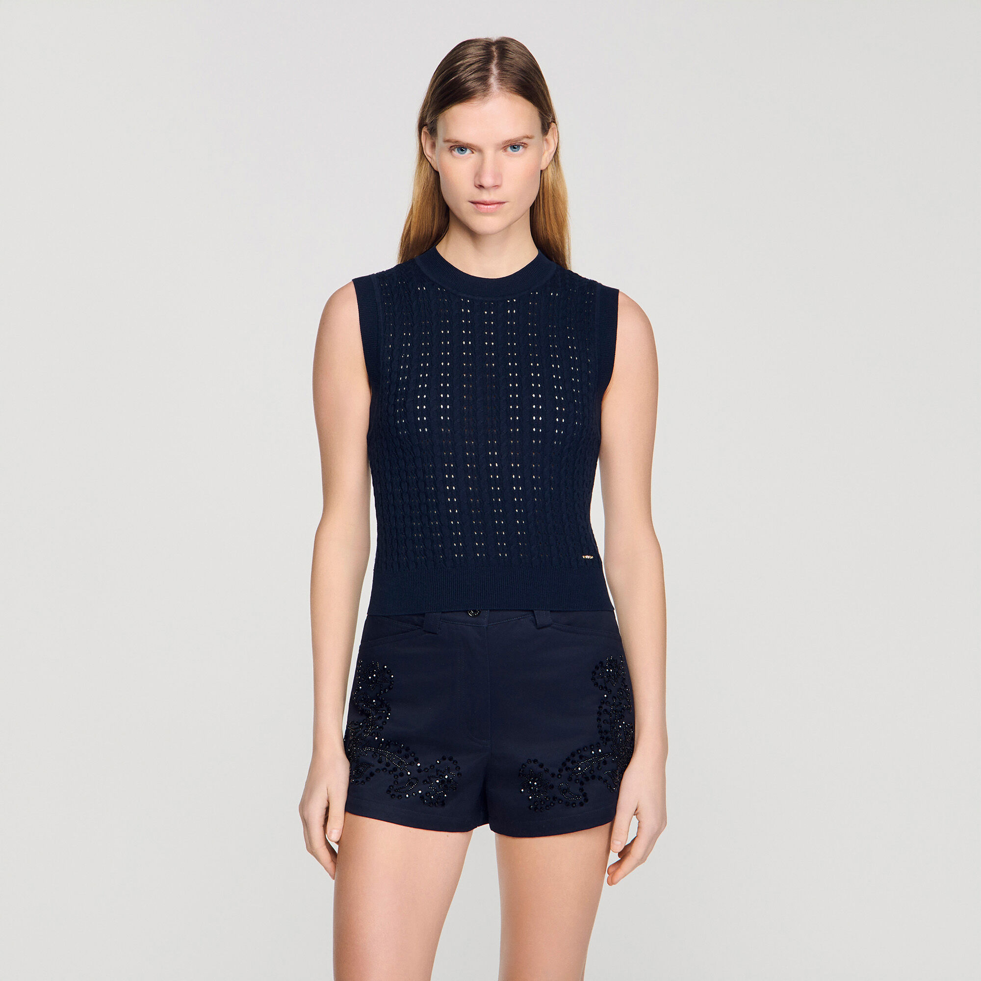Sweater de punto acanalado corto