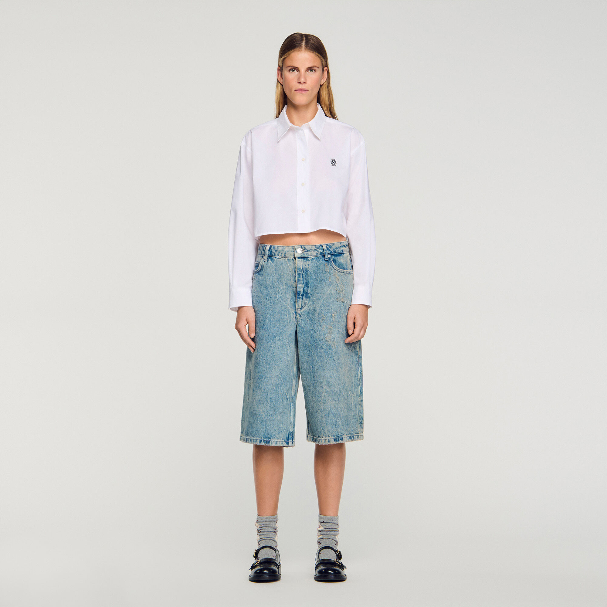 Pantalones cortos de mezclilla con efecto desgastado