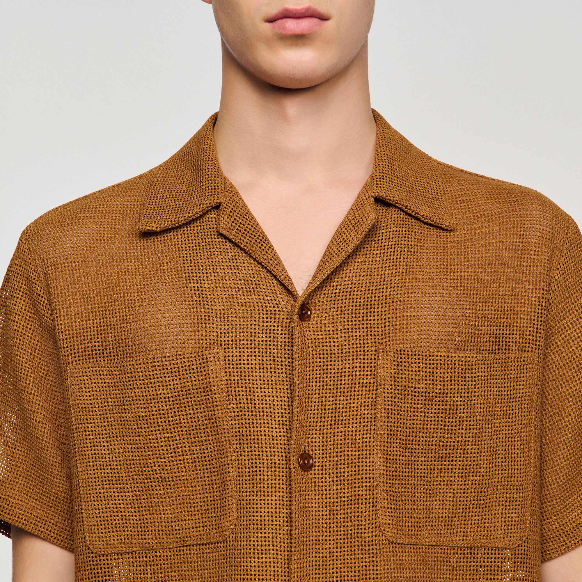 Camisa de malla abierta