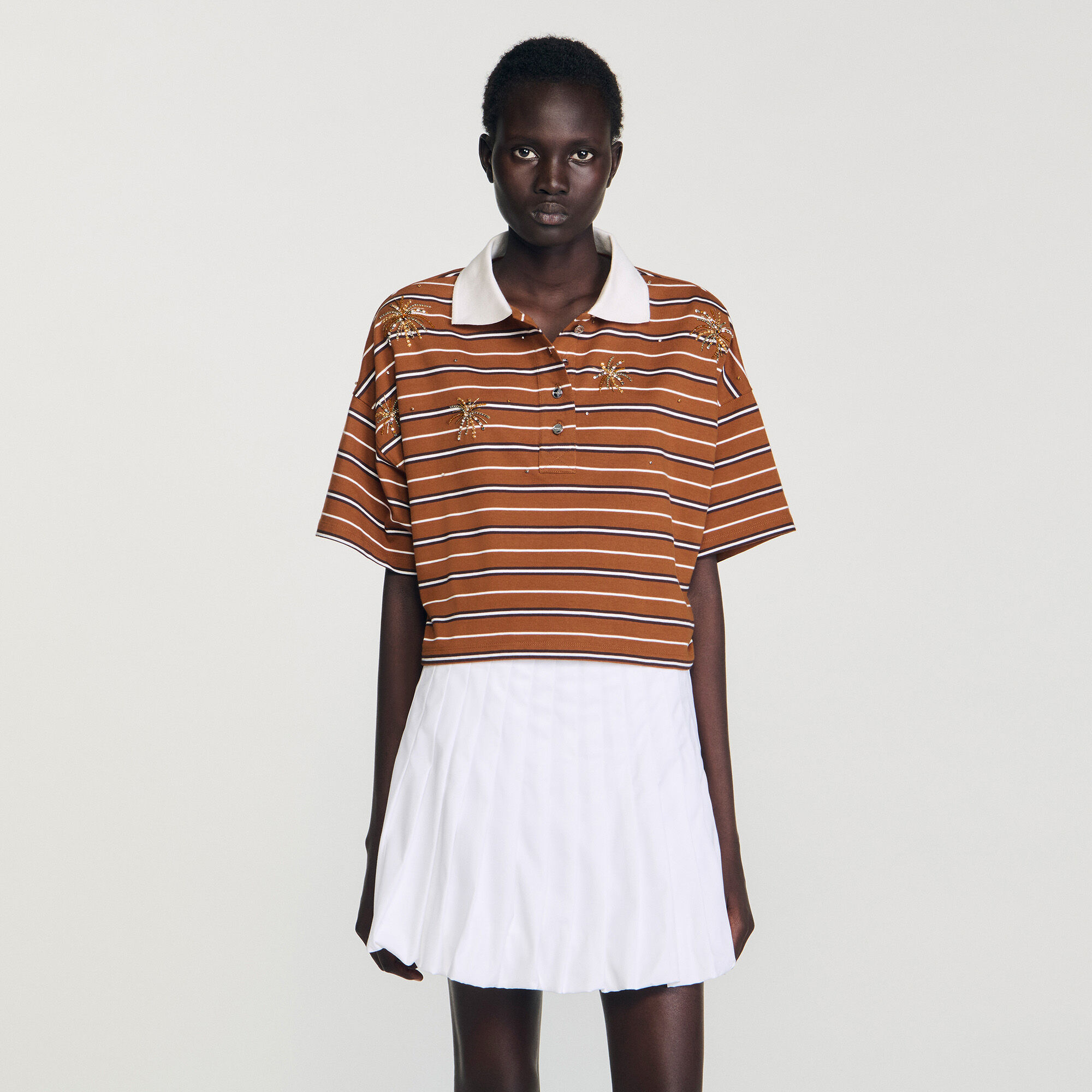 Polo de brillantina con rayas
