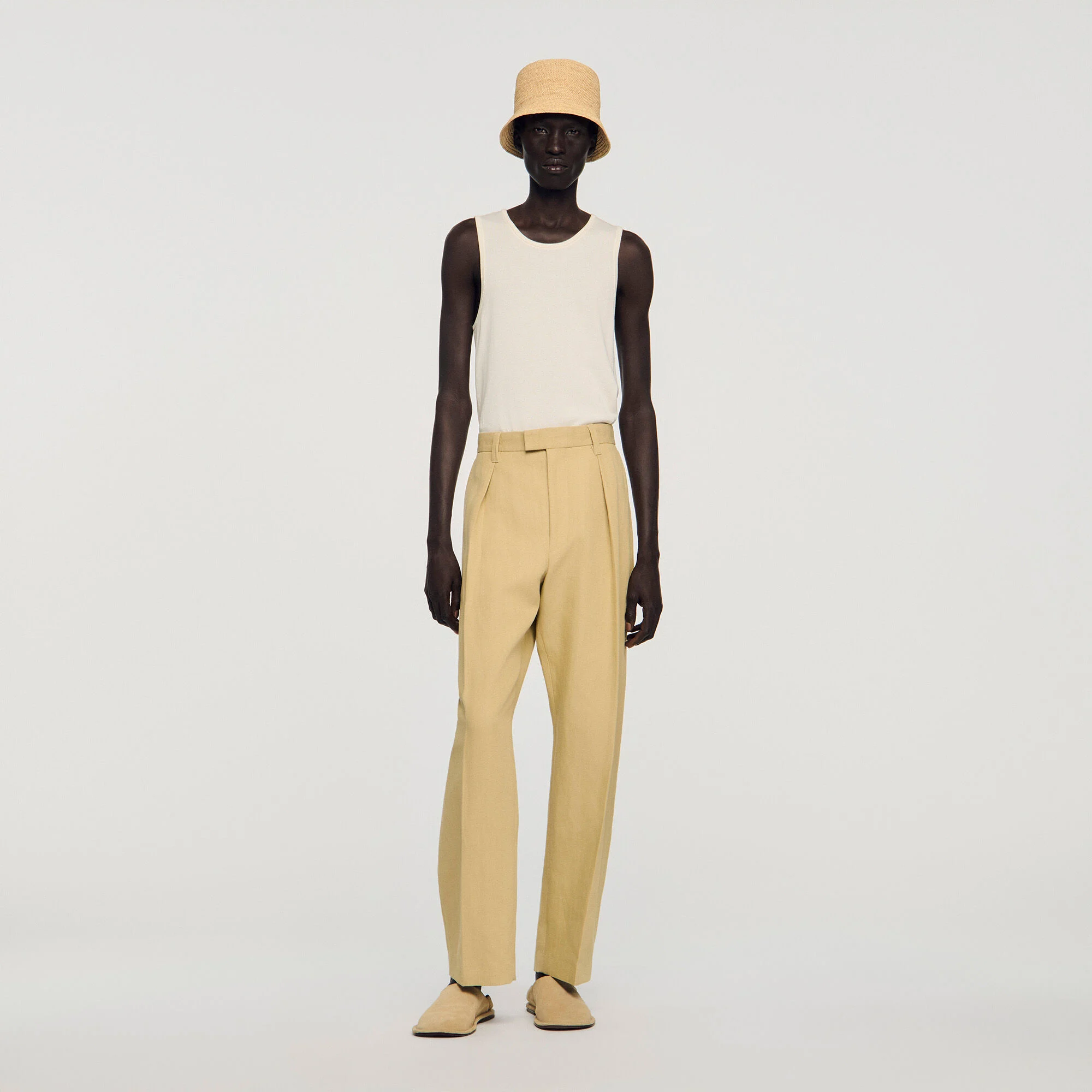 Pantalones amplios de algodón y lino con plisados