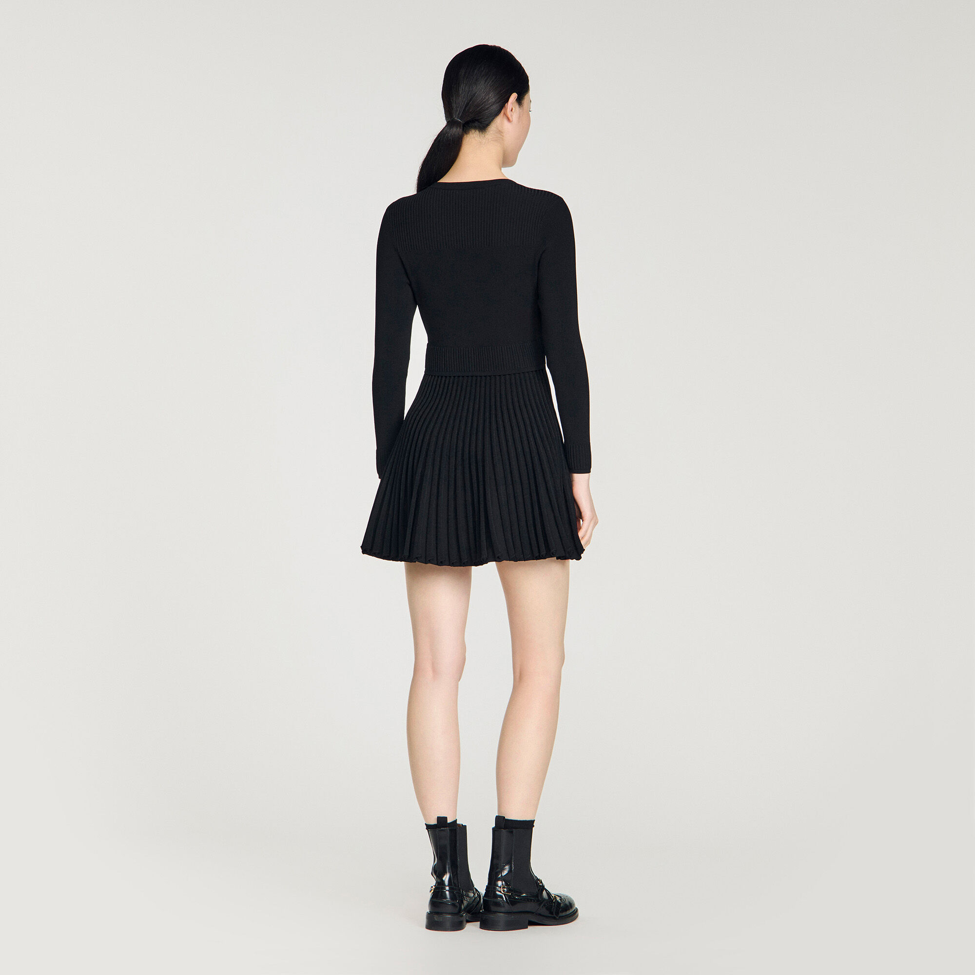 Vestido mini de punto con plisados