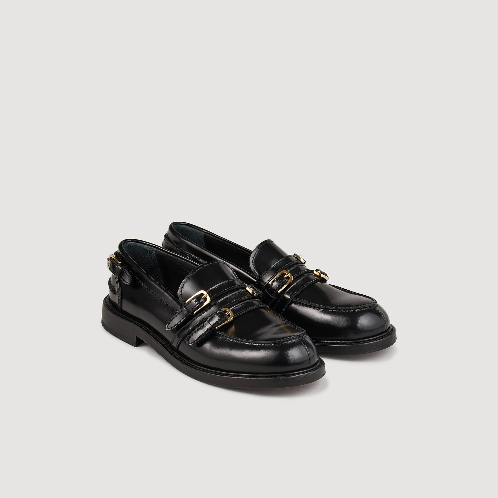 Zapatillas con hebilla