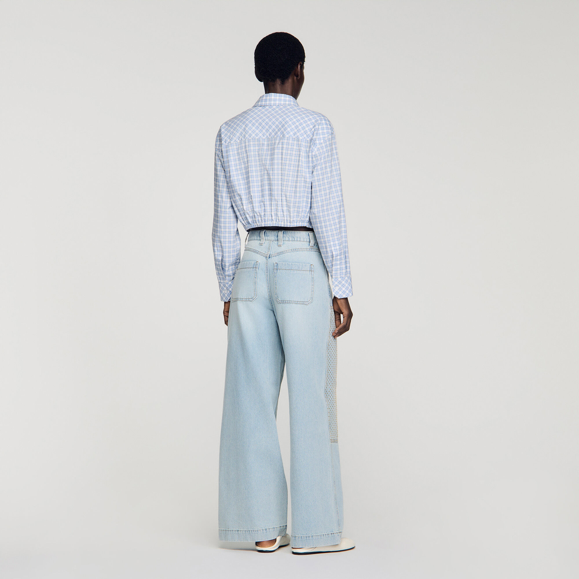 Pantalones de mezclilla rectos con parches de cristal desgastados